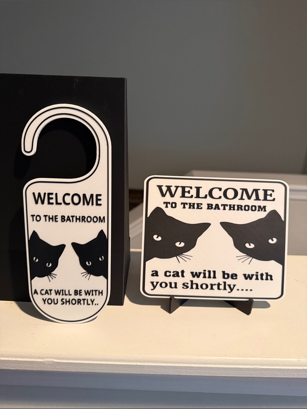Welcome to the Bathroom Cat Door Hanger & Sign - Black and White